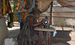woman with sewing machine