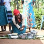 A cooking demonstration in Biguli subcounty under a Nutrition activity. Photo credit: AVSI
